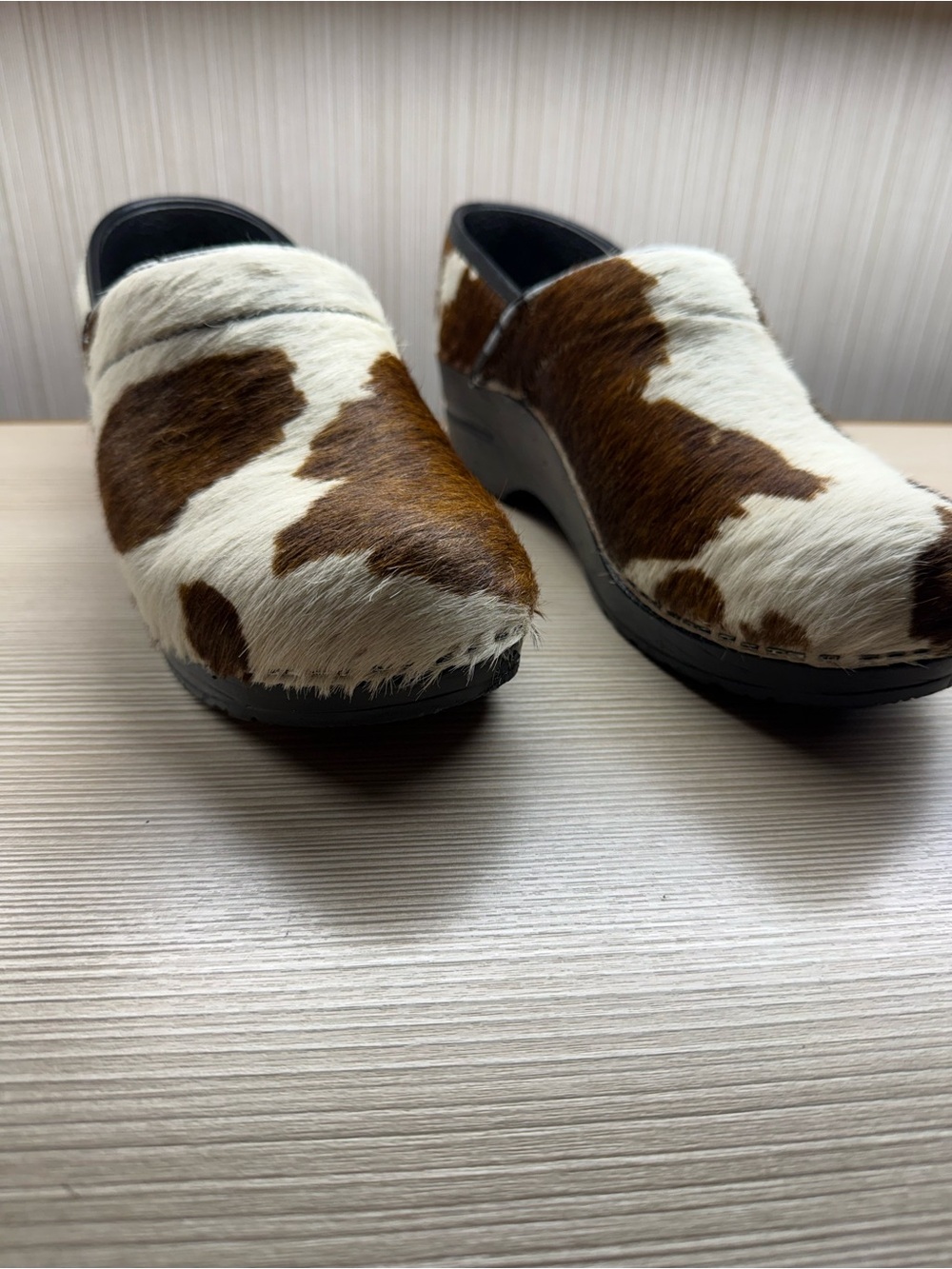 Sanita Brown and White Cowhide Clogs